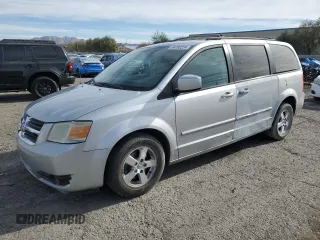 2009 Dodge Grand Caravan SXT z VIN 2D8HN54159R620187, wystawiony jako Copart lot #84703224 z przebiegiem 206 240 mil mil oraz Szkoda całkowita • Salvage title. Historia ofert i sprzedaży dostępna na DreamBid. Obrazek 1.