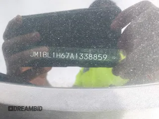 2010 Mazda 3 S Sport with VIN JM1BL1H67A1338859, listed as a IAAI auction lot 42492082 with 91,956 mi miles and . Bid and sale history available at DreamBid. Image 9.