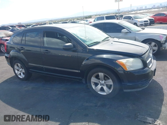 2010 Dodge Caliber SXT with VIN 1B3CB4HAXAD651644, listed as a IAAI auction lot 42173361 with 195,480 mi miles and . Bid and sale history available at DreamBid. Image 14.