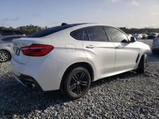 2019 BMW X6 xDrive35i with VIN 5UXKU2C5XK0Z65384, listed as a Copart auction lot 46660415 with 89,984 mi miles and Salvage Title. Bid and sale history available at carsss.com. Image 3.