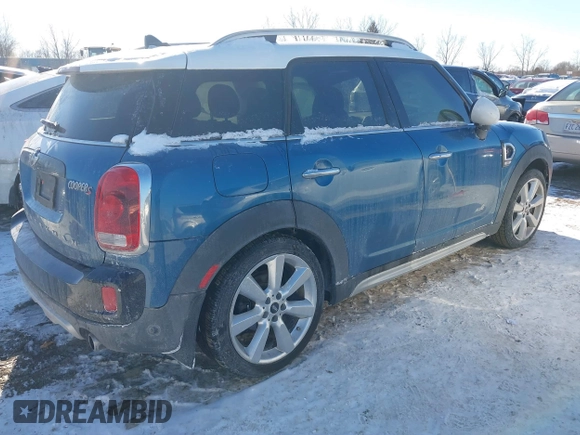 2018 MINI Countryman Cooper S with VIN WMZYT5C3XJ3E61612, listed as a IAAI auction lot 41276107 with 59,554 mi miles and . Bid and sale history available at DreamBid. Image 4.