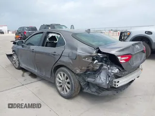 2020 Toyota Camry LE with VIN 4T1C11AK1LU505201, listed as a IAAI auction lot 42006393 with 106,526 mi miles and . Bid and sale history available at carsss.com. Image 3.