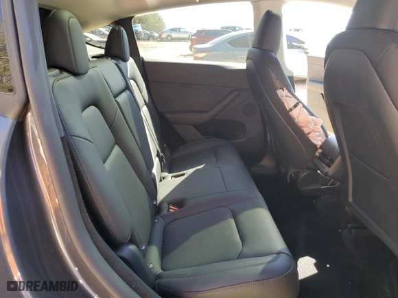 2025 Tesla Model Y Long Range with VIN 7SAYGDEE7SA345301, listed as a Copart auction lot 46693835 with 1,733 mi miles and Salvage Title. Bid and sale history available at carsss.com. Image 12.