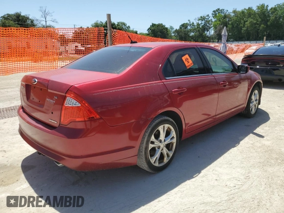 2012 Ford Fusion SE z VIN 3FAHP0HG0CR421694, wystawiony jako Copart lot #57179145 z przebiegiem 208 731 mil mil oraz Czysty tytuł • Clean title. Historia ofert i sprzedaży dostępna na DreamBid. Obrazek 3.