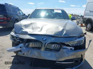 2018 BMW 3 Series 330i with VIN WBA8B9G58JNU98341, listed as a IAAI auction lot 41909777 with 85,396 mi miles and . Bid and sale history available at DreamBid. Image 13.
