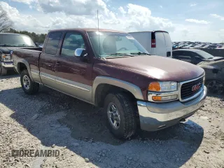 2000 GMC New Sierra 1500 SLE with VIN 1GTEK19T7YZ202845, listed as a Copart auction lot 51596555 with 243,067 mi miles and Salvage Title. Bid and sale history available at carsss.com. Image 4.