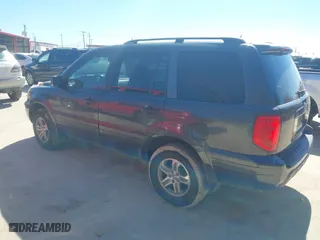 2004 Honda Pilot EX with VIN 2HKYF18574H532409, listed as a IAAI auction lot 41701760 with 302,949 mi miles. Bid and sale history available at carsss.com. Image 3.
