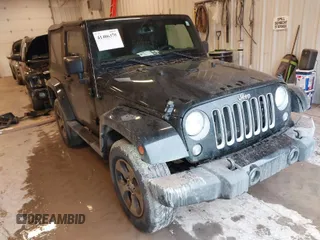 2016 Jeep Wrangler Sahara with VIN 1C4AJWBG0GL123367, listed as a IAAI auction lot 41406370 with 105,110 mi miles and . Bid and sale history available at DreamBid. Image 1.