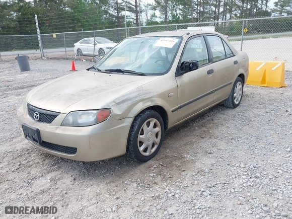 2003 Mazda Protege DX with VIN JM1BJ225430210759, listed as a IAAI auction lot 41957515 with 186,705 mi miles. Bid and sale history available at carsss.com. Image 2.