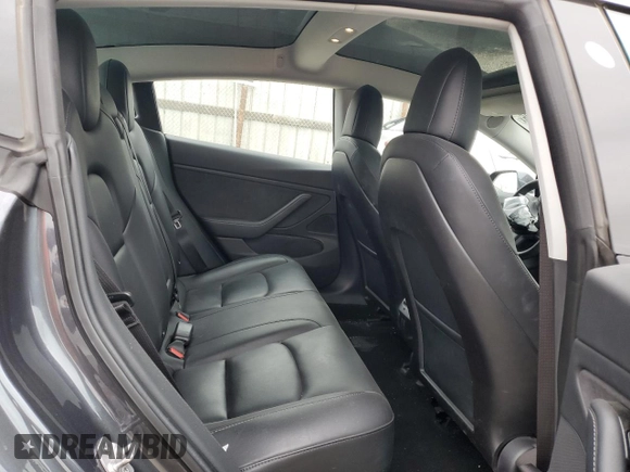 2018 Tesla Model 3 Long Range Battery z VIN 5YJ3E1EA7JF123805, wystawiony jako Copart lot #56034325 z przebiegiem 90 249 mil mil oraz Szkoda całkowita • Salvage title. Historia ofert i sprzedaży dostępna na DreamBid. Obrazek 10.