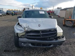 2002 Dodge Dakota with VIN 1B7GL12X42S698285, listed as a IAAI auction lot 40826030 with 211,936 mi miles and . Bid and sale history available at carsss.com. Image 13.
