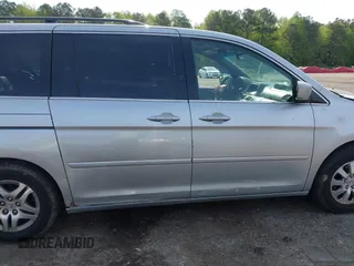 2010 Honda Odyssey EX-L with VIN 5FNRL3H78AB034756, listed as a IAAI auction lot 41979532 with 167,791 mi miles and . Bid and sale history available at DreamBid. Image 13.