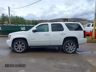 2013 Chevrolet Tahoe LT with VIN 1GNSKBE05DR293054, listed as a IAAI auction lot 41955877 with 192,474 mi miles and . Bid and sale history available at DreamBid. Image 15.