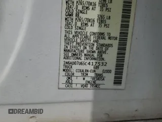 2005 Nissan Frontier LE with VIN 1N6AD07U65C417532, listed as a Copart auction lot 61588315 with 197,514 mi miles and Salvage title. Bid and sale history available at DreamBid. Image 12.