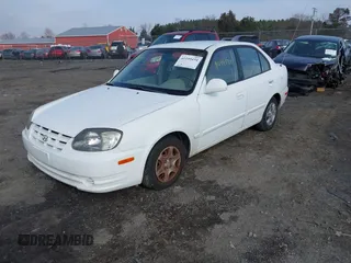 2004 Hyundai Accent GL with VIN KMHCG45C64U539526, listed as a IAAI auction lot 41199434 with 81,442 mi miles. Bid and sale history available at carsss.com. Image 2.