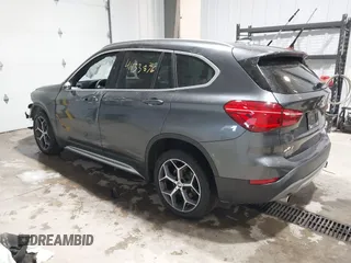 2018 BMW X1 xDrive28i with VIN WBXHT3C38J5L34625, listed as a IAAI auction lot 41133876 with 60,986 mi miles and . Bid and sale history available at DreamBid. Image 3.