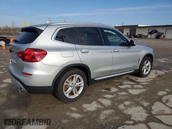 2018 BMW X3 xDrive30i with VIN 5UXTR9C59JLD59797, listed as a Copart auction lot 52063755 with Not Provided miles and Salvage Title. Bid and sale history available at DreamBid. Image 3.