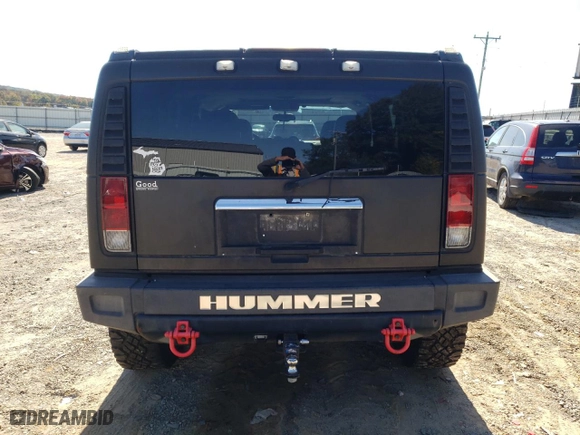 2005 Hummer H2 SUV with VIN 5GRGN23U65H108432, listed as a Copart auction lot 76786844 with 248,780 mi miles and Salvage Title. Bid and sale history available at carsss.com. Image 6.