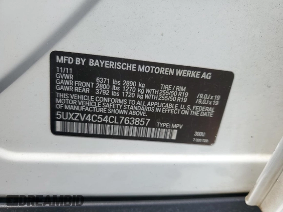 2012 BMW X5 35i with VIN 5UXZV4C54CL763857, listed as a Copart auction lot 57943195 with 143,522 mi miles and Salvage title. Bid and sale history available at DreamBid. Image 13.