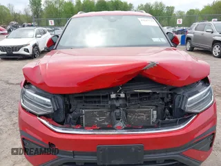 2022 Volkswagen Tiguan SE z VIN 3VV2B7AX9NM129948, wystawiony jako IAAI lot #42247719 z przebiegiem 59 501 mil mil oraz . Historia ofert i sprzedaży dostępna na DreamBid. Obrazek 12.