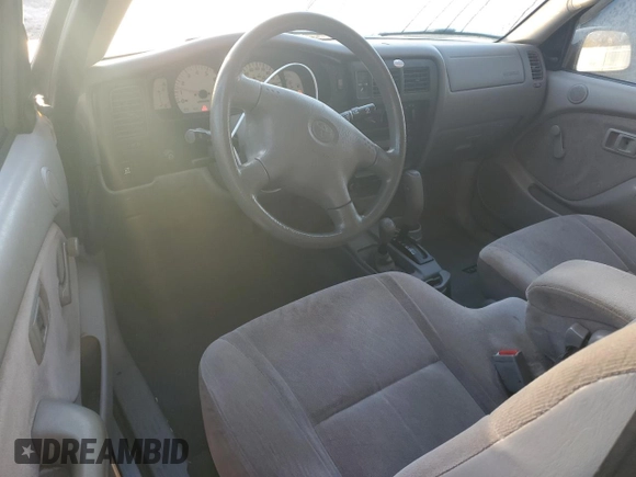 2001 Toyota Tacoma with VIN 5TEWM72N51Z875124, listed as a Copart auction lot 48407995 with 223,133 mi miles and Salvage title. Bid and sale history available at DreamBid. Image 8.