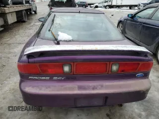 1995 Ford Probe z VIN 1ZVLT22B9S5142588, wystawiony jako Copart lot #89005925 z przebiegiem 83 937 mil mil oraz Szkody całkowita. Historia ofert i sprzedaży dostępna na DreamBid. Obrazek 6.