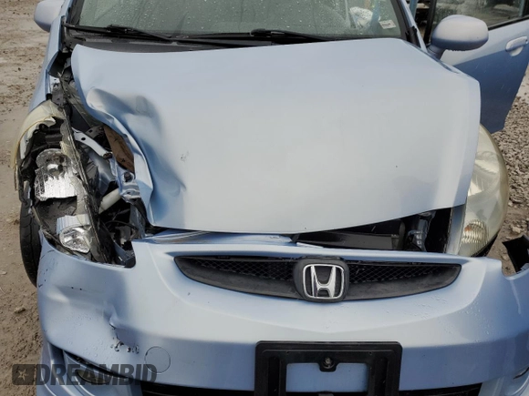 2008 Honda Fit Sport z VIN JHMGD38648S051884, wystawiony jako Copart lot #57613495 z przebiegiem Nie podano mil oraz Szkoda całkowita • Salvage title. Historia ofert i sprzedaży dostępna na DreamBid. Obrazek 11.