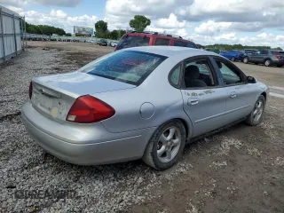 2002 Ford Taurus SES Standard with VIN 1FAFP55U02A115781, listed as a Copart auction lot 59007595 with 97,189 mi miles and Salvage title. Bid and sale history available at DreamBid. Image 3.