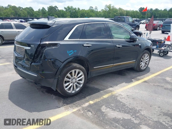 2017 Cadillac XT5 Platinum AWD z VIN 1GYKNFRS9HZ125677, wystawiony jako IAAI lot #42366784 z przebiegiem 152 116 mil mil oraz . Historia ofert i sprzedaży dostępna na DreamBid. Obrazek 4.