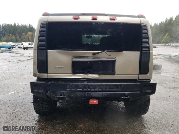 2003 Hummer H2 with VIN 5GRGN23U73H111109, listed as a Copart auction lot 76388144 with 160,179 mi miles and Salvage Title. Bid and sale history available at carsss.com. Image 6.