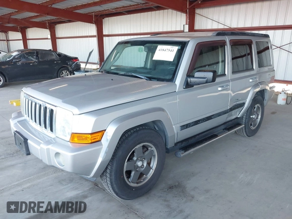 2008 Jeep Commander Sport with VIN 1J8HH48K58C143456, listed as a IAAI auction lot 41847541 with 163,209 mi miles and . Bid and sale history available at DreamBid. Image 2.