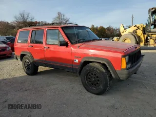 1994 Jeep Cherokee Sport with VIN 1J4FJ68S3RL239208, listed as a Copart auction lot 79121184 with 226,579 mi miles and Salvage title. Bid and sale history available at DreamBid. Image 4.