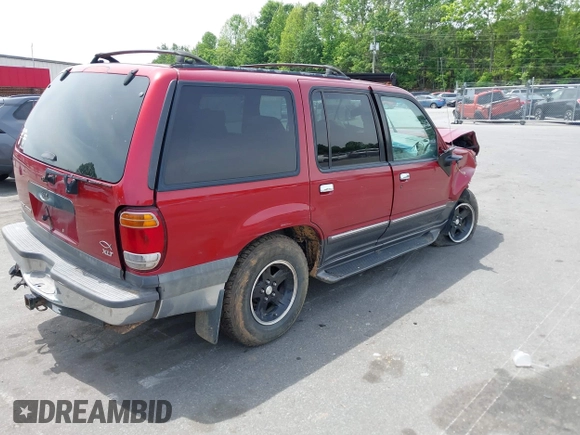 2000 Ford Explorer XLT z VIN 1FMZU73E7YZB60956, wystawiony jako IAAI lot #42218666 z przebiegiem 234 289 mil mil oraz . Historia ofert i sprzedaży dostępna na DreamBid. Obrazek 4.