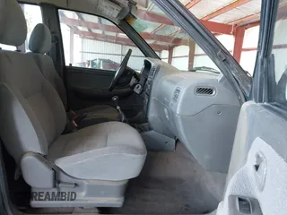 2000 Kia Sportage with VIN KNDJB7232Y5651398, listed as a IAAI auction lot 41678617 with 156,144 mi miles. Bid and sale history available at carsss.com. Image 5.