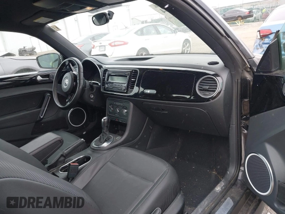 2012 Volkswagen Beetle 2.5L PZEV with VIN 3VWJP7AT0CM628169, listed as a IAAI auction lot 41628754 with 64,770 mi miles and . Bid and sale history available at DreamBid. Image 5.