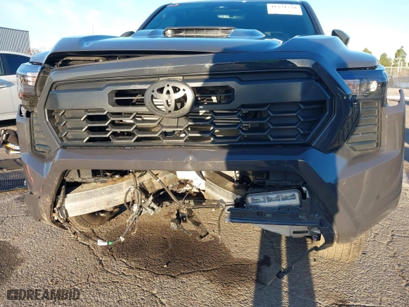 2024 Toyota Tacoma 4WD SR5 with VIN 3TMLB5JN3RM046513, listed as a IAAI auction lot 41231528 with 7,091 mi miles. Bid and sale history available at carsss.com. Image 6.