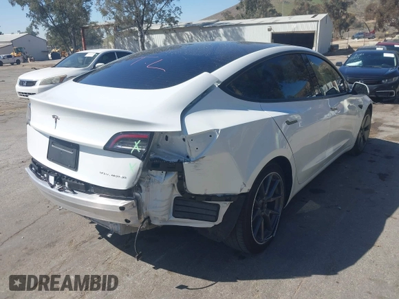2022 Tesla Model 3 Long Range z VIN 5YJ3E1EB8NF212930, wystawiony jako IAAI lot #41658127 z przebiegiem 43 773 mil mil oraz . Historia ofert i sprzedaży dostępna na DreamBid. Obrazek 4.