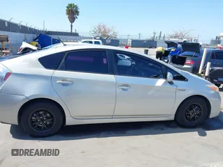 2015 Toyota Prius Four with VIN JTDKN3DU1F1986165, listed as a IAAI auction lot 42281036 with 212,838 mi miles and . Bid and sale history available at DreamBid. Image 13.