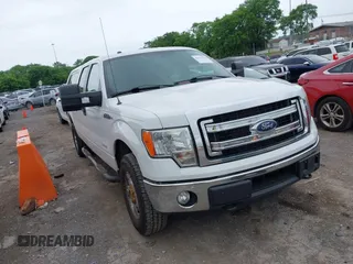 2014 Ford F-150 XL with VIN 1FTFW1ET8EFB33627, listed as a IAAI auction lot 42170252 with 173,886 mi miles. Bid and sale history available at carsss.com. Image 1.