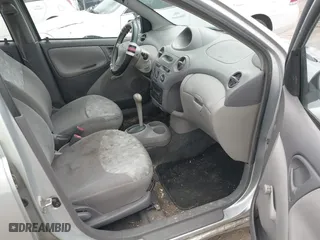 2002 Toyota ECHO with VIN JTDBT123X20203719, listed as a IAAI auction lot 42091031 with 258,946 mi miles. Bid and sale history available at carsss.com. Image 5.