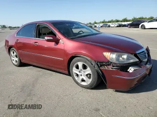 2007 Acura RL Technology z VIN JH4KB16677C004641, wystawiony jako Copart lot #59049755 z przebiegiem 176 704 mil mil oraz Szkoda całkowita • Salvage title. Historia ofert i sprzedaży dostępna na DreamBid. Obrazek 4.