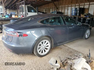 2017 Tesla Model S 100D with VIN 5YJSA1E20HF198419, listed as a Copart auction lot 61481605 with 52,853 mi miles and Salvage title. Bid and sale history available at DreamBid. Image 3.