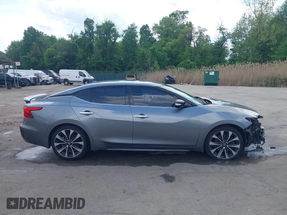 2016 Nissan Maxima SL with VIN 1N4AA6AP7GC395308, listed as a IAAI auction lot 42187762 with 154,171 mi miles and . Bid and sale history available at DreamBid. Image 14.