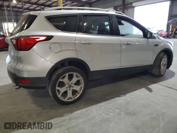 2019 Ford Escape Titanium with VIN 1FMCU0J96KUB77741, listed as a Copart auction lot 57517325 with 90,002 mi miles and Non repairable. Bid and sale history available at DreamBid. Image 3.