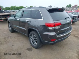 2021 Jeep Grand Cherokee 80th Anniversary with VIN 1C4RJFBG4MC669104, listed as a IAAI auction lot 42319682 with 37,397 mi miles and . Bid and sale history available at DreamBid. Image 3.