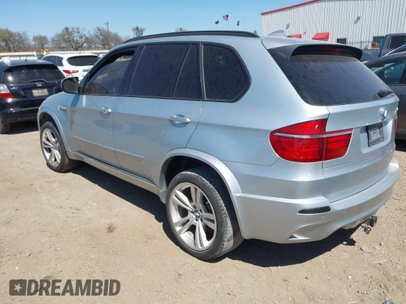 2011 BMW X5 M with VIN 5YMGY0C53BLK26167, listed as a IAAI auction lot 41742529 with 118,777 mi miles. Bid and sale history available at carsss.com. Image 3.