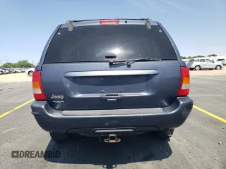 2004 Jeep Grand Cherokee Limited z VIN 1J4GW58S34C330987, wystawiony jako Copart lot #59089675 z przebiegiem 249 335 mil mil oraz Szkoda całkowita • Salvage title. Historia ofert i sprzedaży dostępna na DreamBid. Obrazek 6.
