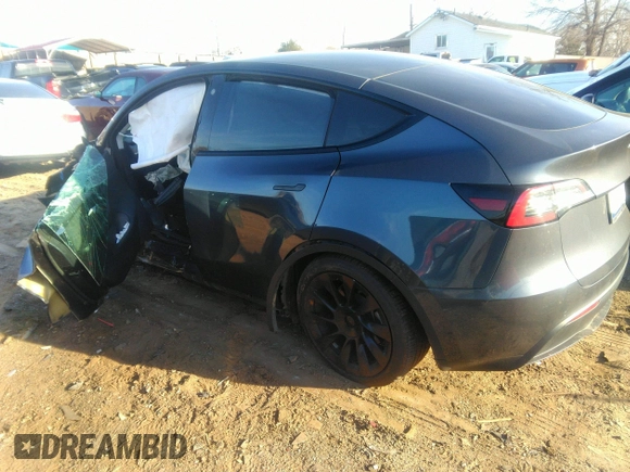 2022 Tesla Model Y Long Range with VIN 7SAYGDEE9NF424928, listed as a IAAI auction lot 41807225 with Not Provided miles and . Bid and sale history available at carsss.com. Image 3.