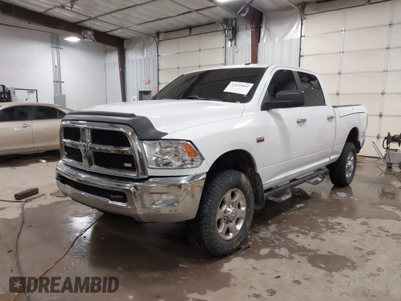 2018 Ram 2500 SLT с VIN 3C6TR5DTXJG284102, выставлен на аукционе IAAI как лот 41609869 с пробегом 148 869 миль миль и . История ставок и продаж доступна на DreamBid. Изображение 2.