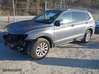 2019 Volkswagen Tiguan S with VIN 3VV0B7AX1KM059932, listed as a IAAI auction lot 41757859 with 76,522 mi miles. Bid and sale history available at carsss.com. Image 2.